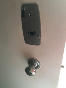 Replacing the back of the lock with a new plate.