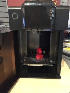 The Tiertime Up Mini 3D printer spit out this tiny dinosaur model.